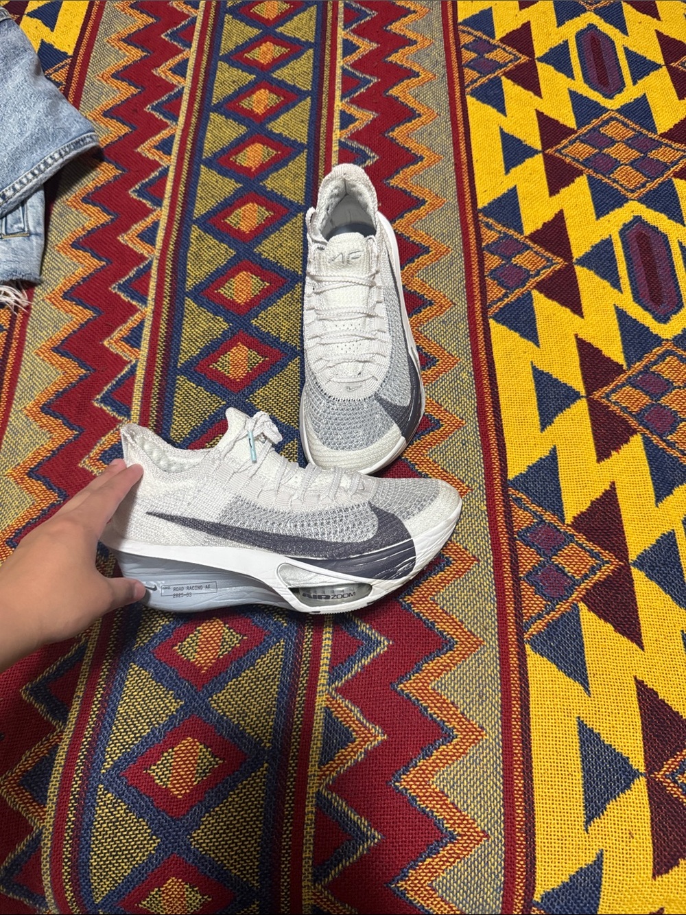 Nike White and Gray Running Shoes with Large Swoosh open to offers